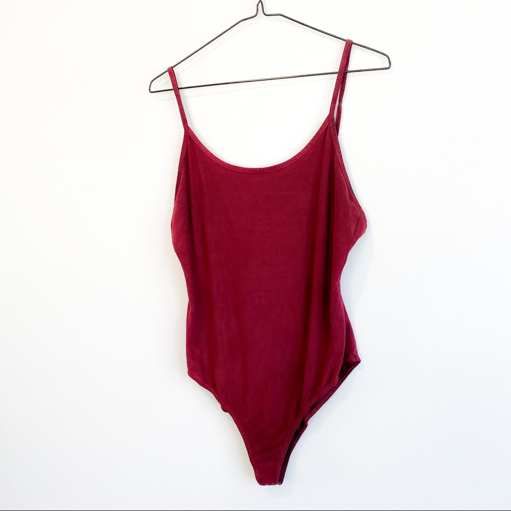 maroon body suit